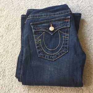 A Pea in the Pod True Religion dark wash jeans.